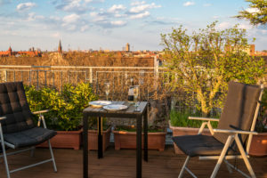 Berlin, top floor, terrace, evening mood, table with champagne glasses Berlin, top floor, terrace, evening mood, table with champagne glasses